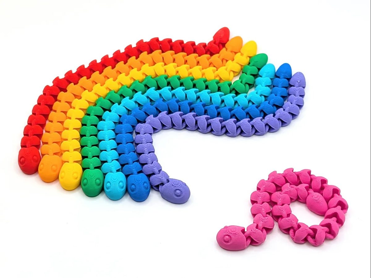 Rainbow of articulated Snakey fidget toys